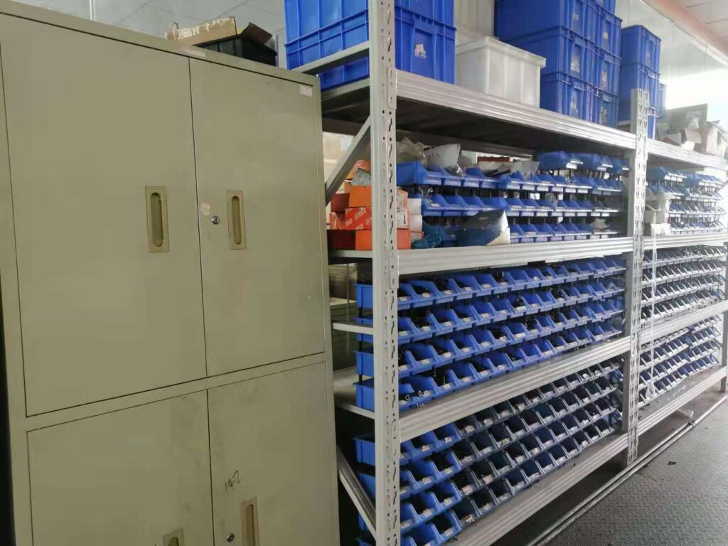 Spare parts storage for phone holder production