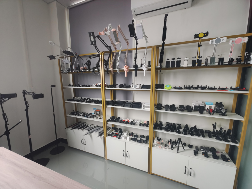 Phone holder product sample display shelf