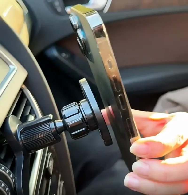 Magnetic air vent car phone holder, attaching smartphone to magnetic mount inside car